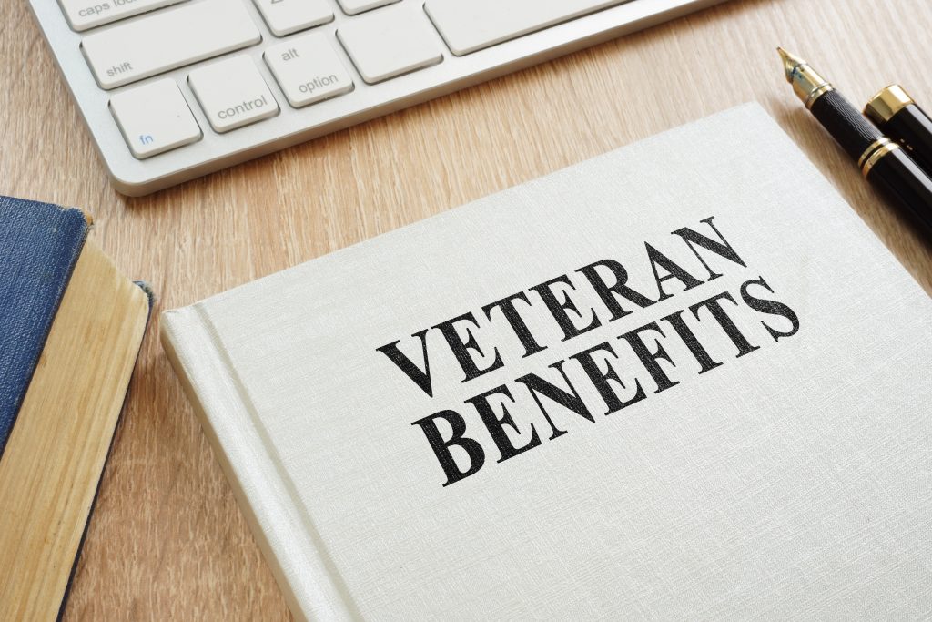Book,About,Veteran,Benefits,On,A,Desk.