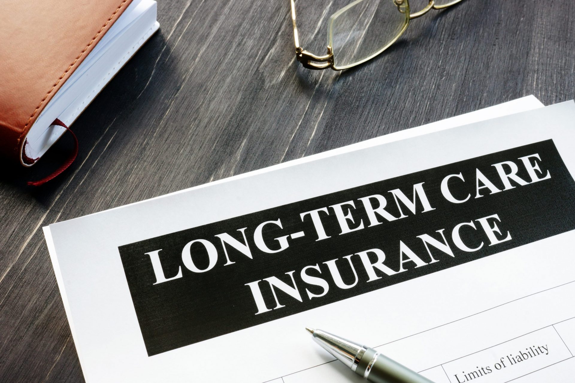 Long-term,Care,Insurance,Agreement,Policy,And,Notebook.